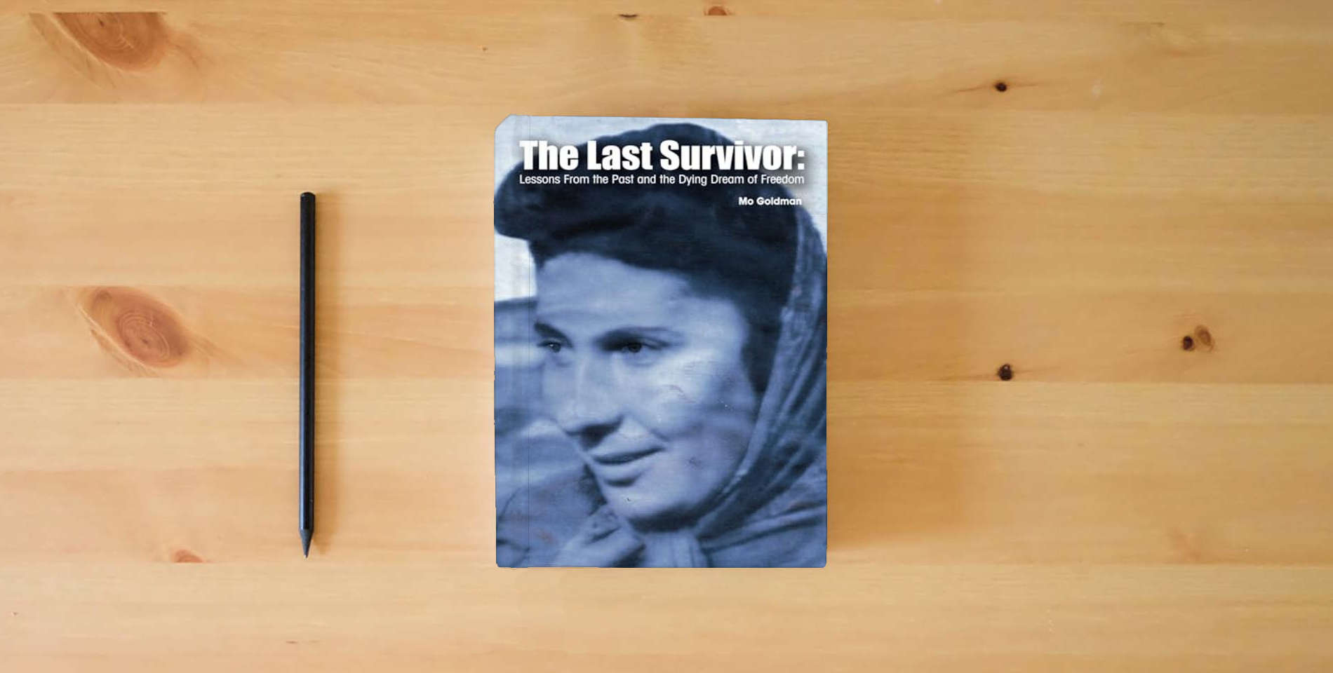 The book The Last Survivor: Lessons From the Past and the Dying Dream of Freedom is on the table