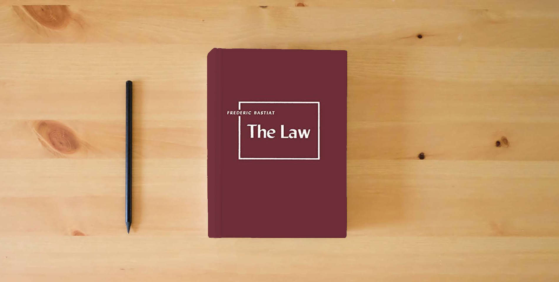 The book The Law is on the table