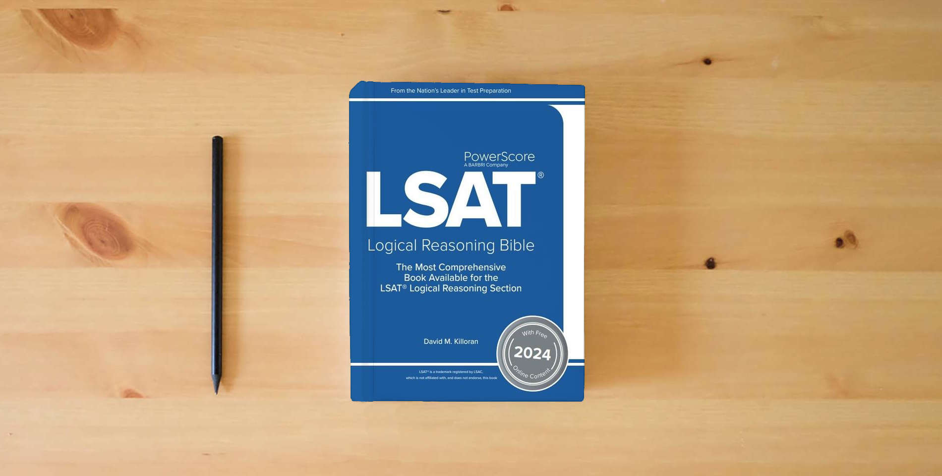 The book The PowerScore LSAT Logical Reasoning Bible 2024: Self-Study Prep Strategies for the Logical Reasoning Section of the LSAT (LSAT Prep) is on the table