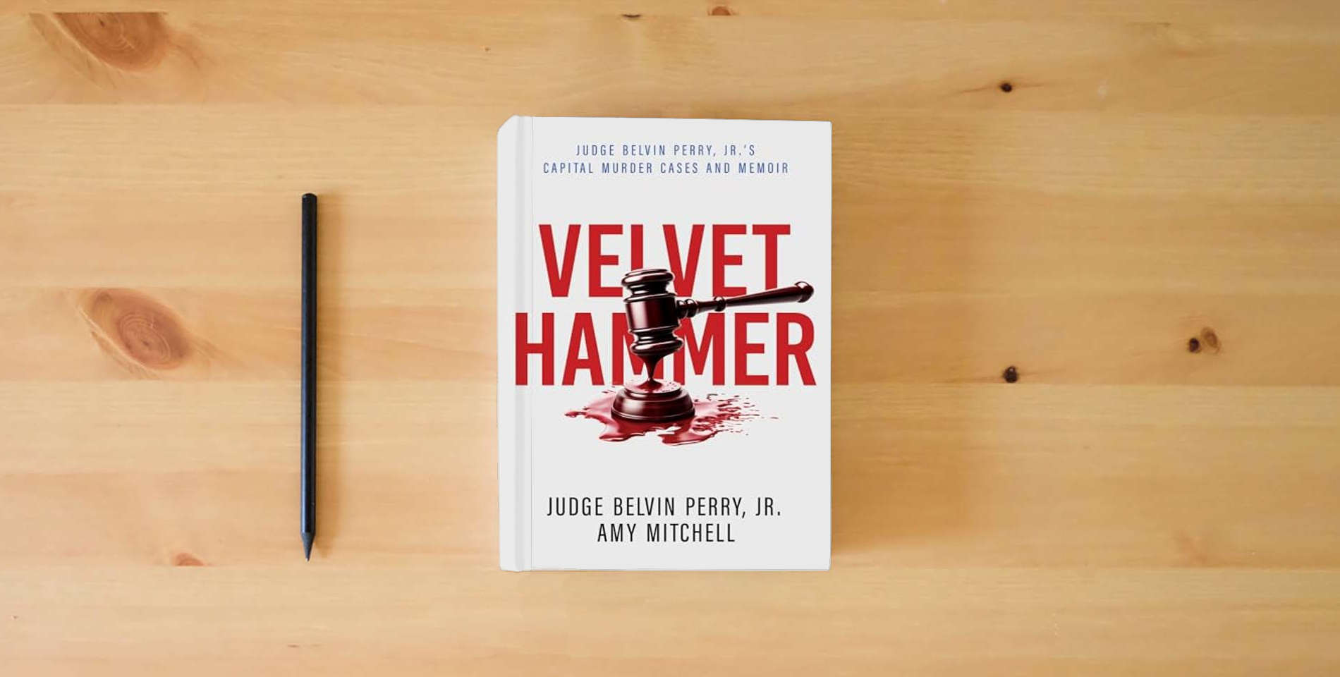 The book The Velvet Hammer: Judge Belvin Perry, Jr.'s Capital Murder Cases and Memoir is on the table