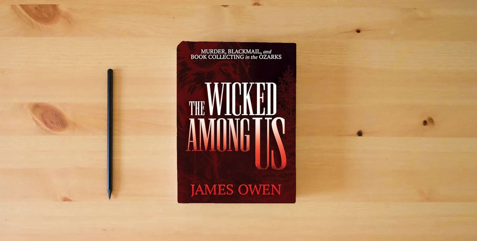 The book The Wicked Among Us: Murder, Blackmail, and Book Collecting in the Ozarks is on the table