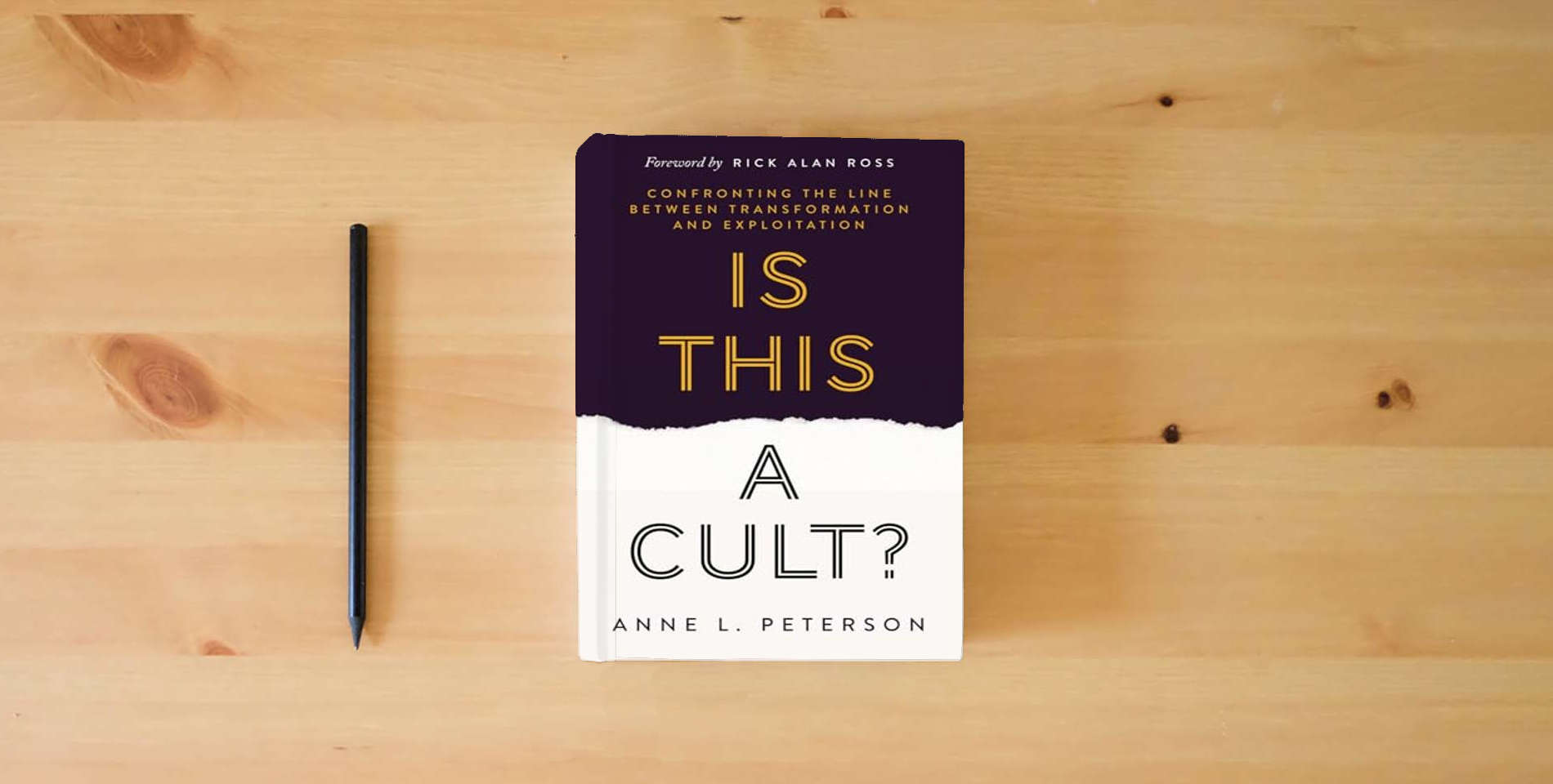 The book Is This a Cult?: Confronting the Line between Transformation and Exploitation is on the table