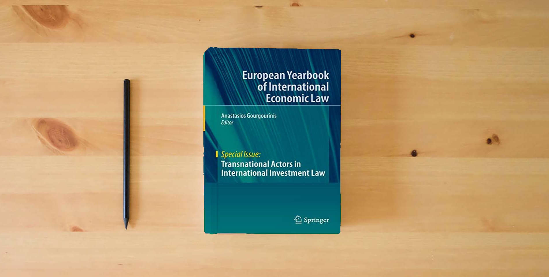 The book Transnational Actors in International Investment Law (European Yearbook of International Economic Law) is on the table