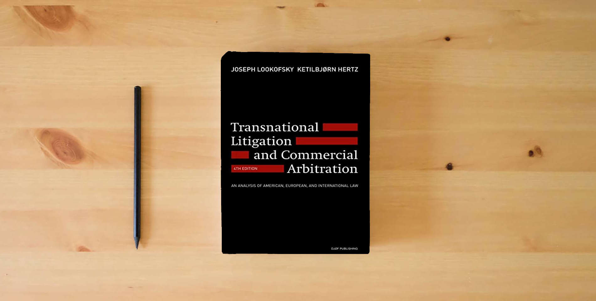 The book Transnational Litigation and Commercial Arbitration: An Analysis of American, European and International Law (Fourth Edition) is on the table