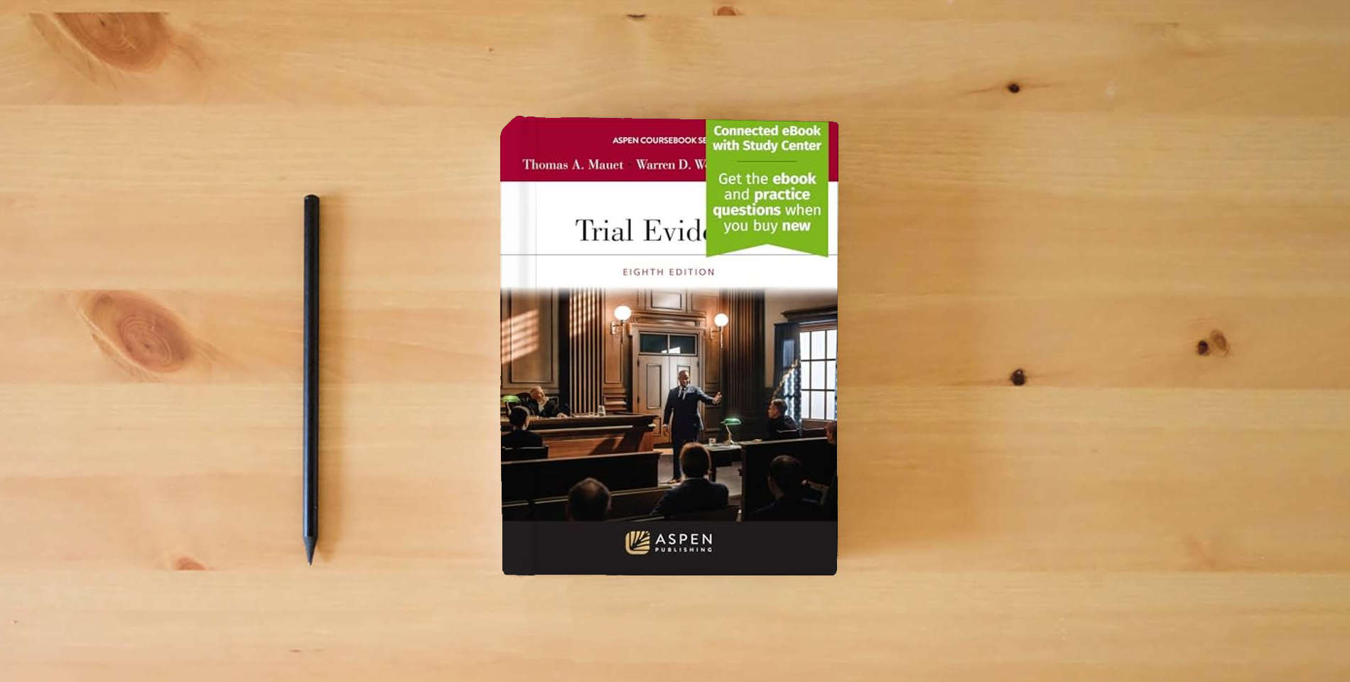 The book Trial Evidence: [Connected eBook with Study Center] (Aspen Coursebook) is on the table