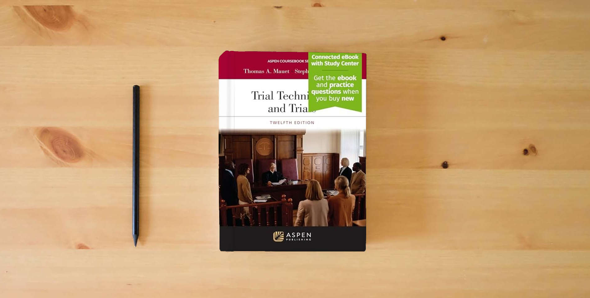 The book Trial Techniques and Trials: With Online Files, Study Center (Aspen Coursebook) is on the table