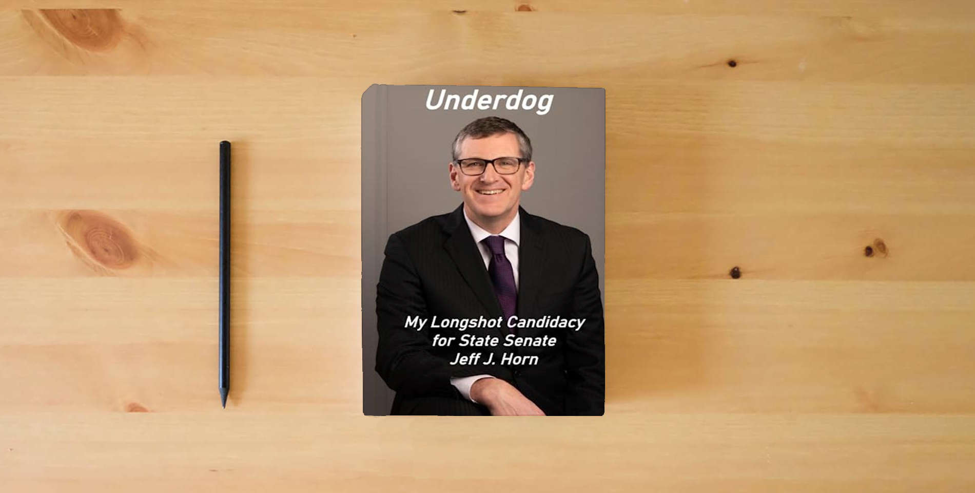The book Underdog: My Longshot Candidacy for State Senate is on the table