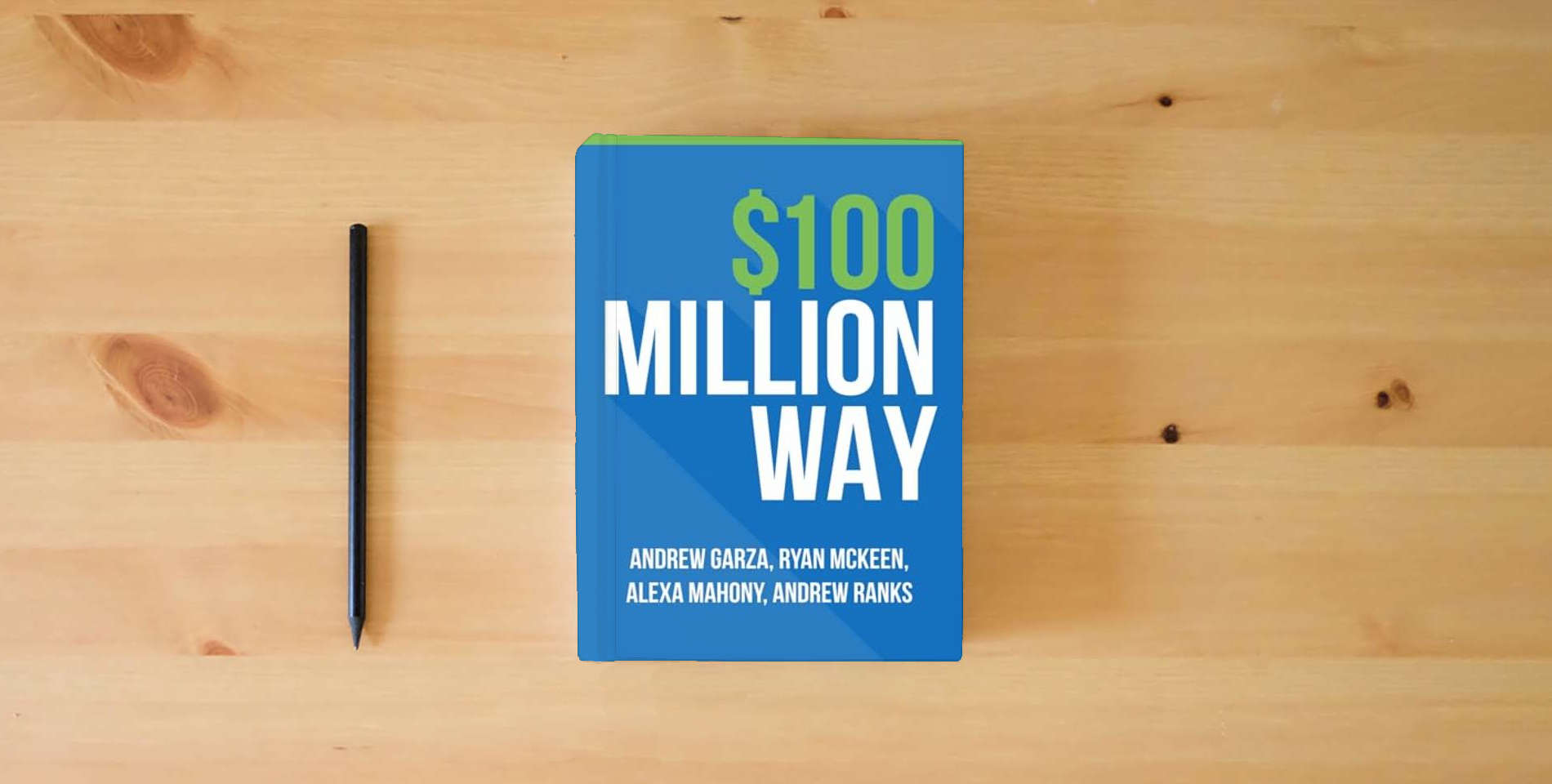The book $100 Million Way is on the table