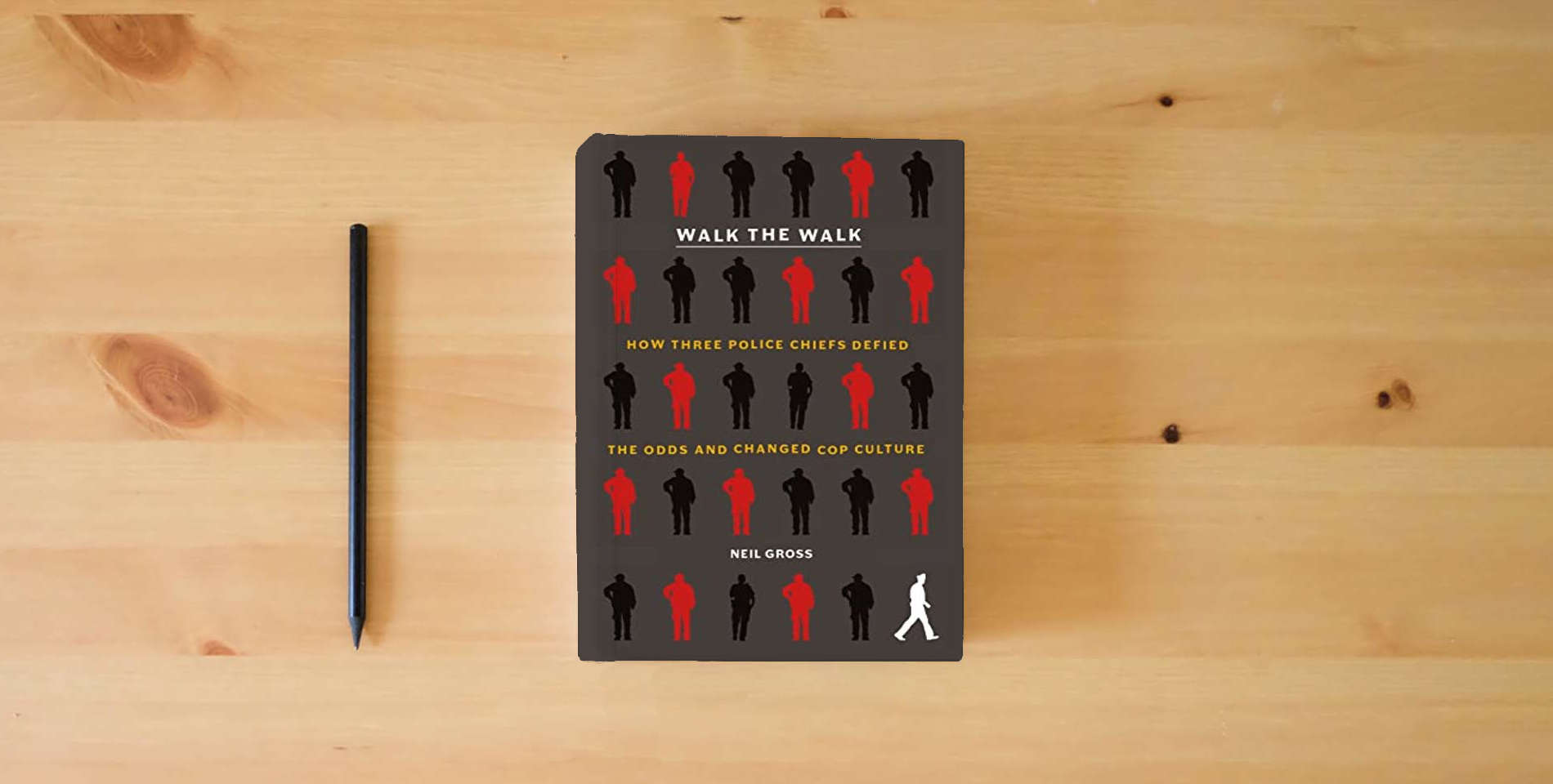 The book Walk the Walk: How Three Police Chiefs Defied the Odds and Changed Cop Culture is on the table