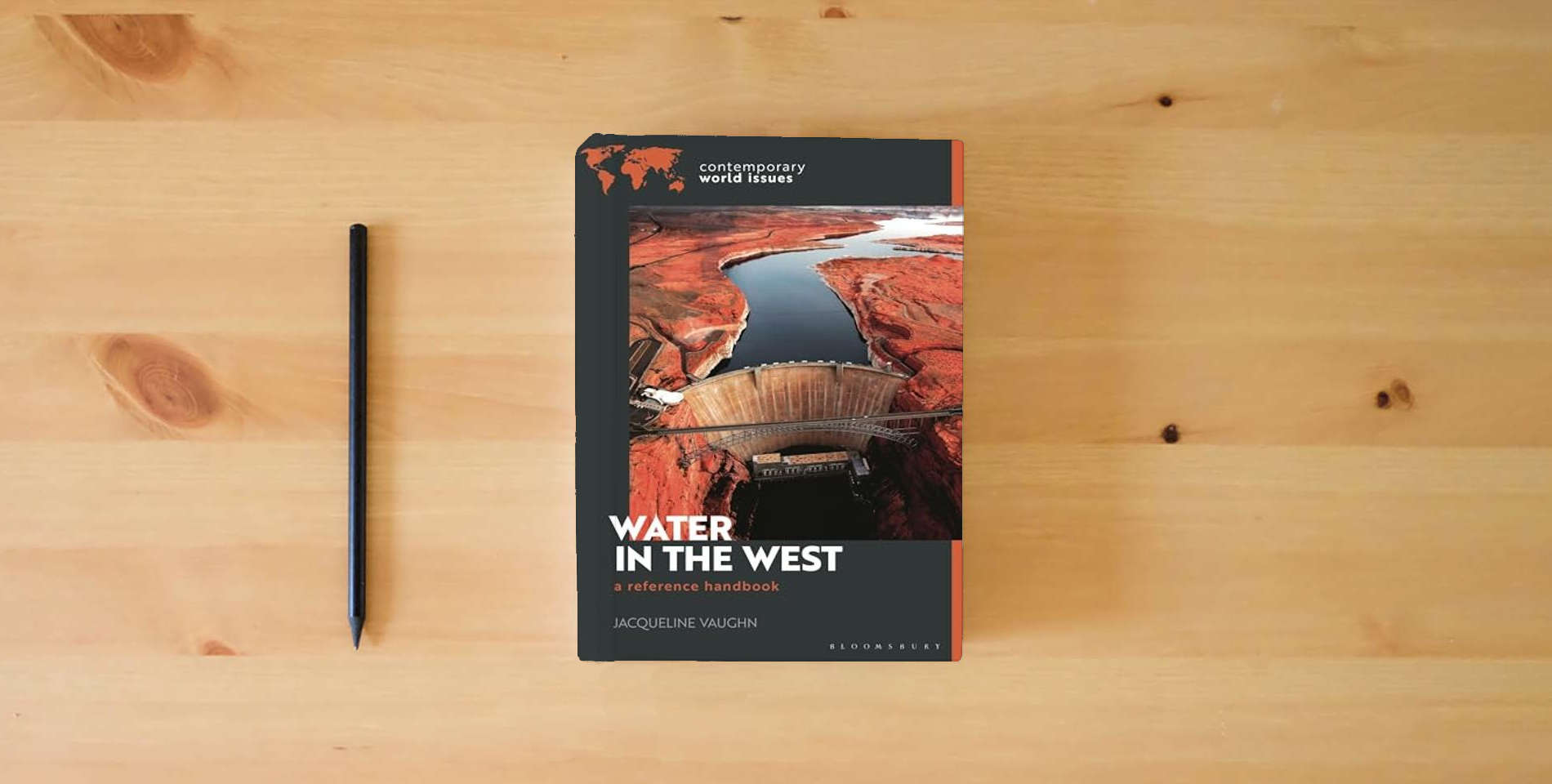 The book Water in the West: A Reference Handbook (Contemporary World Issues) is on the table