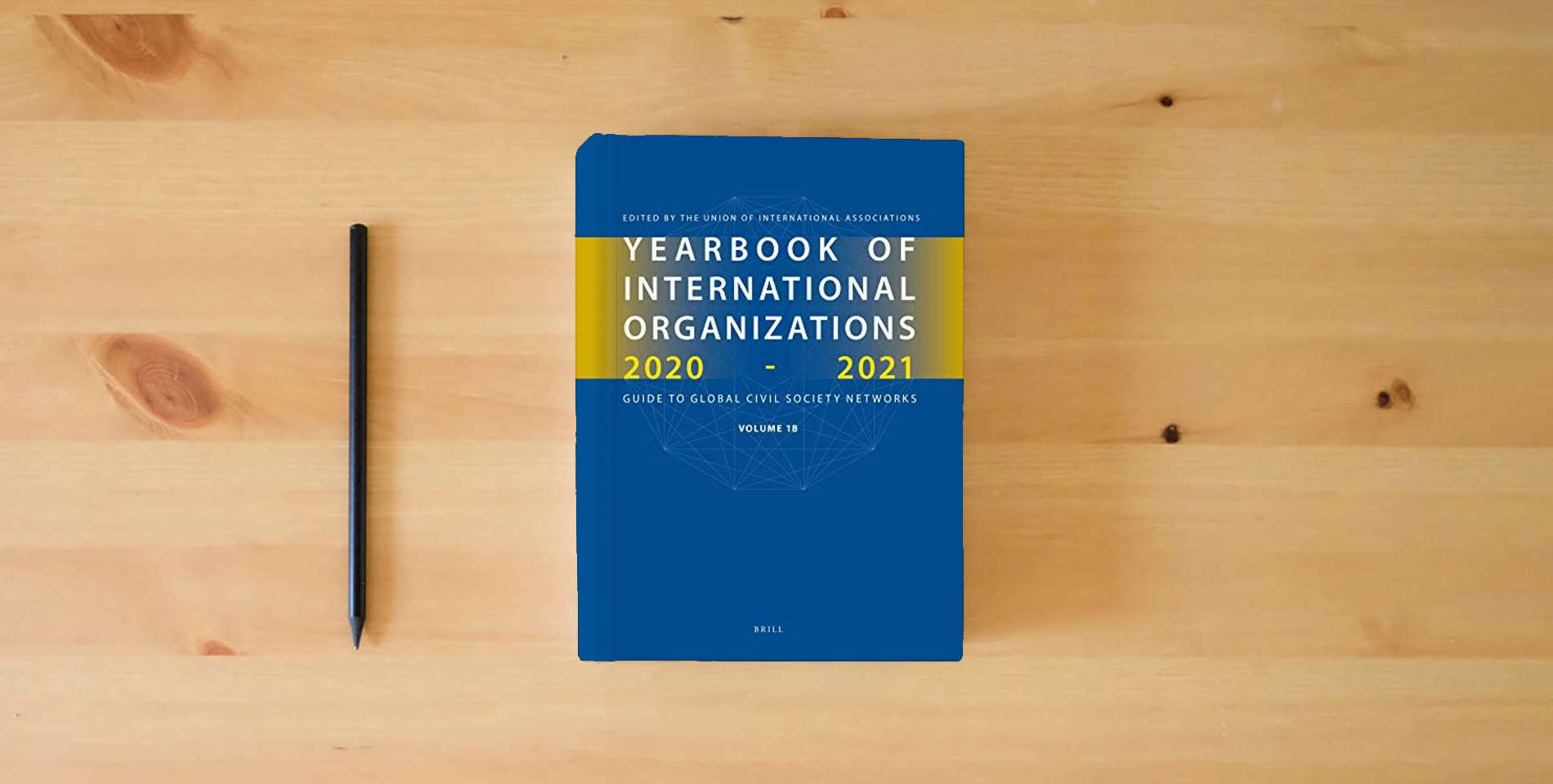 The book Yearbook of International Organizations 2020-2021, Volumes 1A & 1B (SET) is on the table
