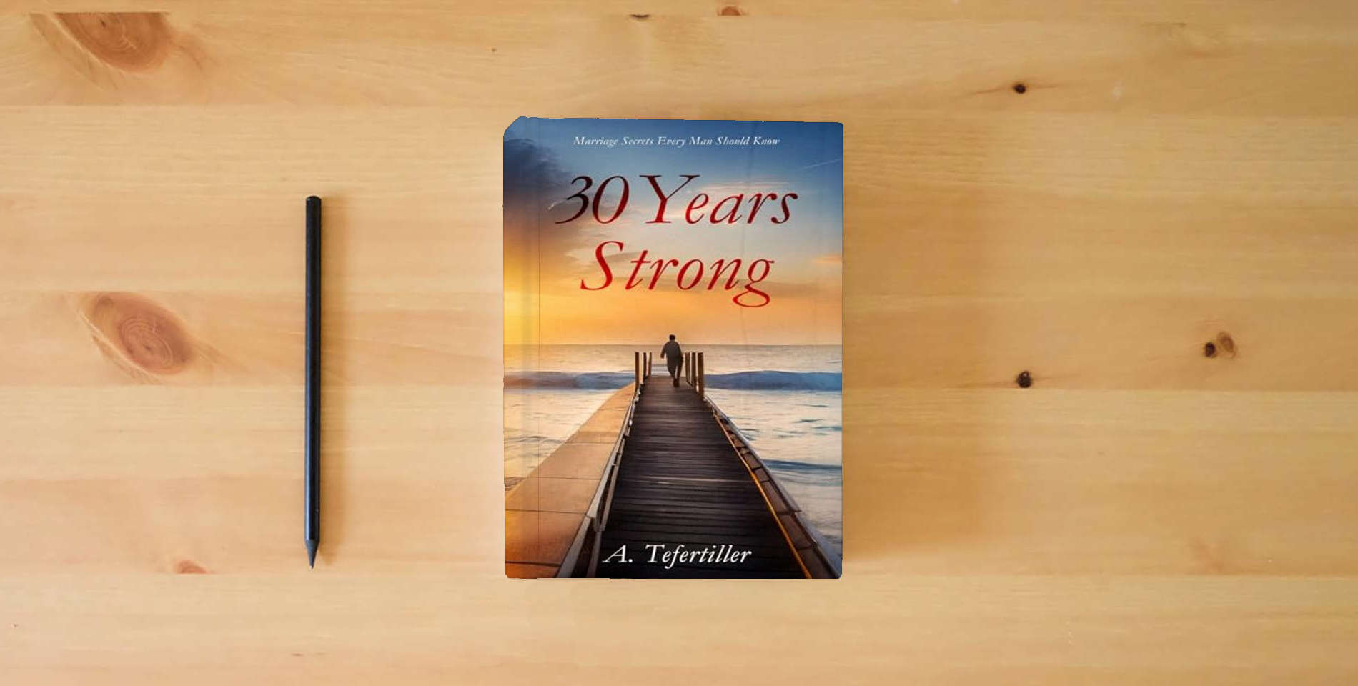 The book 30 Years Strong: Marriage Secrets Every Man Should Know is on the table