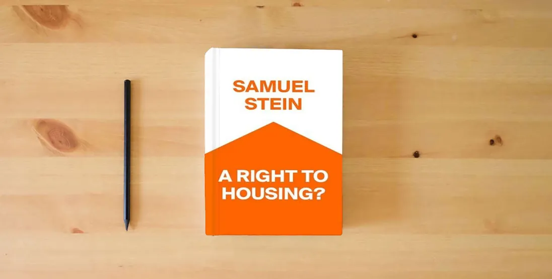 The book A Right to Housing?} is on the table