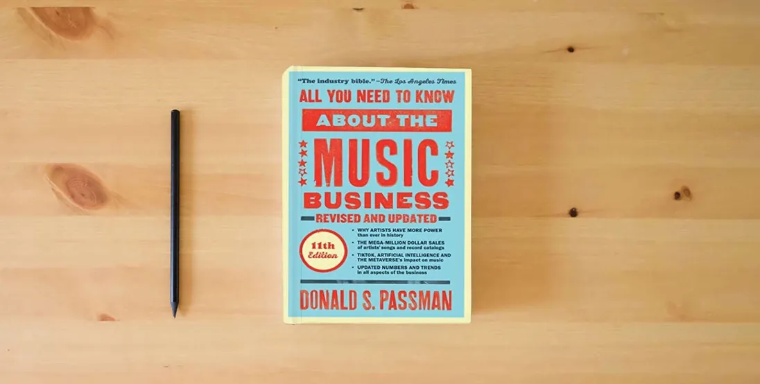 The book All You Need to Know About the Music Business: Eleventh Edition} is on the table