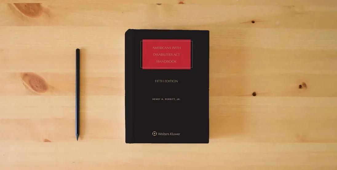 The book Americans With Disabilities Act Handbook} is on the table