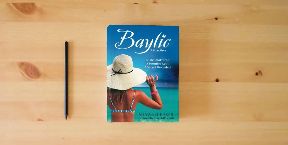 The book Baylie: A Life Shattered. A Promise Kept. A Secret Revealed.} is on the table