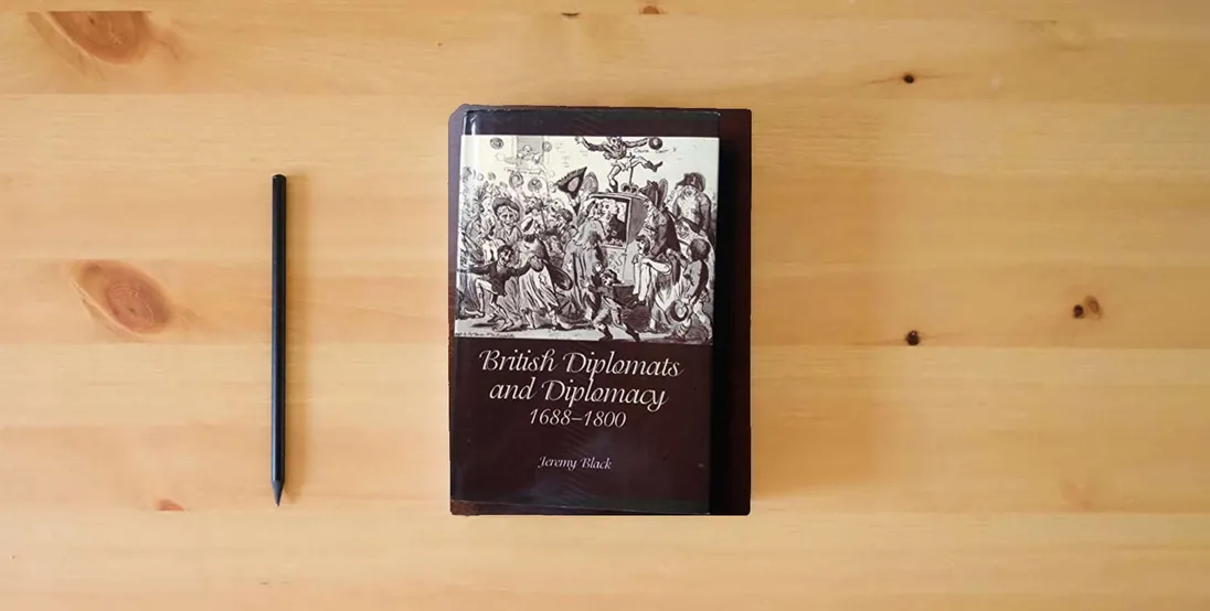 The book British Diplomats and Diplomacy, 1688-1800} is on the table