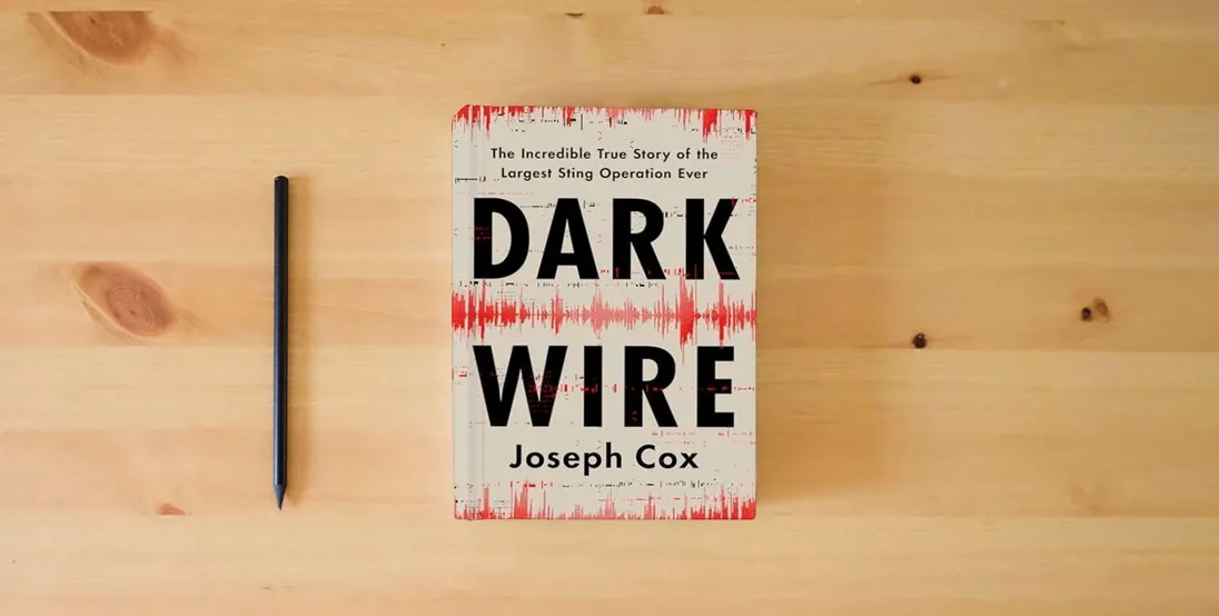 The book Dark Wire: The Incredible True Story of the Largest Sting Operation Ever} is on the table