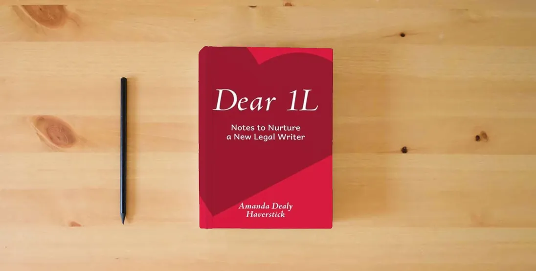 The book Dear 1L: Notes to Nurture a New Legal Writer} is on the table