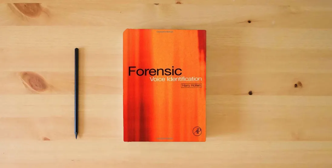 The book Forensic Voice Identification} is on the table
