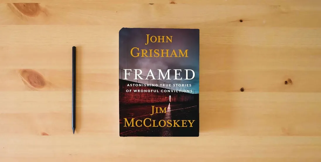 The book Framed: Astonishing True Stories of Wrongful Convictions} is on the table