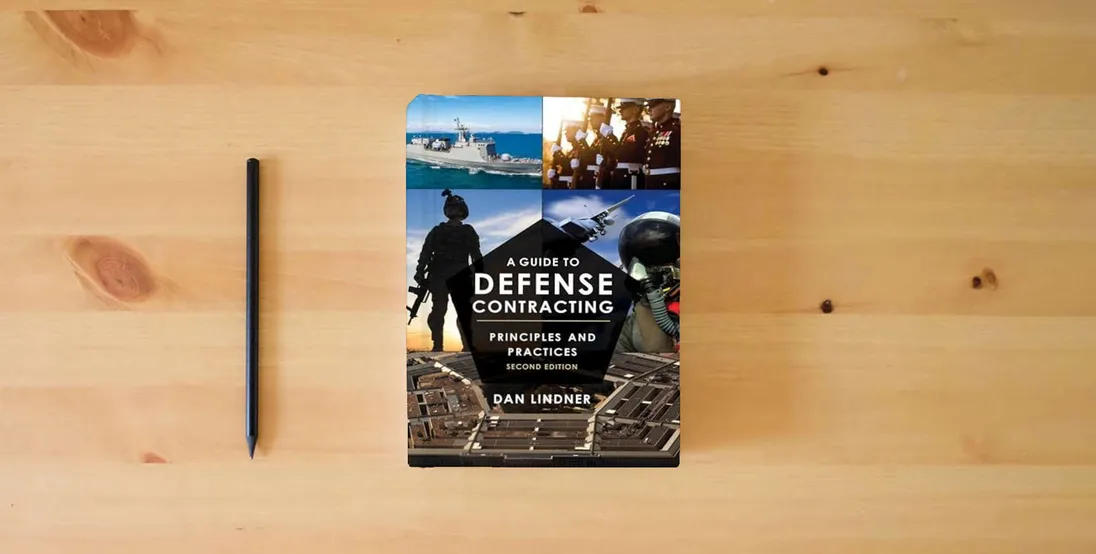 The book A Guide to Defense Contracting: Principles and Practices} is on the table