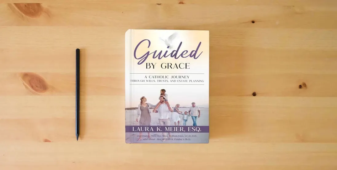 The book Guided by Grace: A Catholic Journey Through Wills, Trusts, and Estate Planning} is on the table