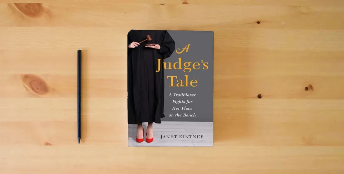 The book A Judge's Tale: A Trailblazer Fights for Her Place on the Bench} is on the table
