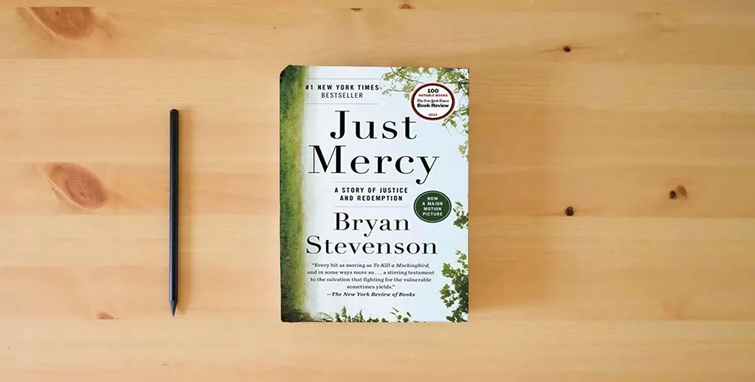 The book Just Mercy: A Story of Justice and Redemption} is on the table