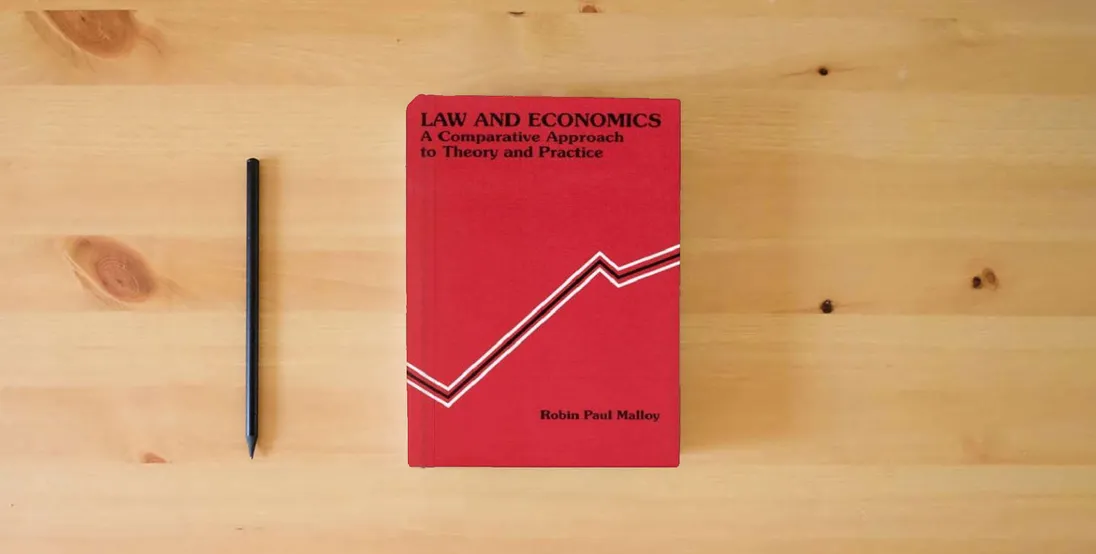 The book Law and Economics: A Comparative Approach to Theory and Practice (American Casebooks) (Coursebook)} is on the table