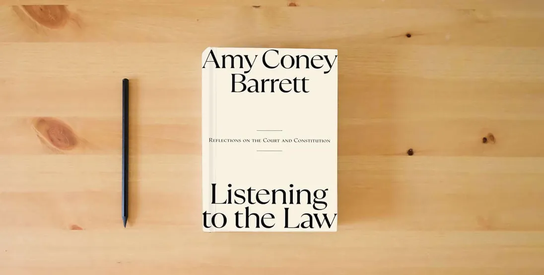 The book Listening to the Law: Reflections on the Court and Constitution} is on the table