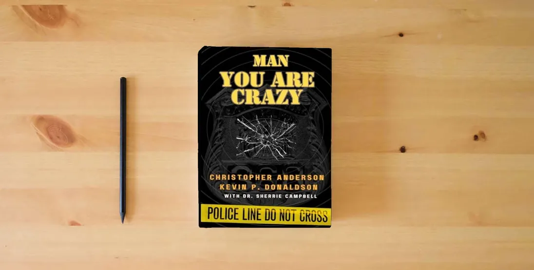 The book Man You Are Crazy: Changing The Face of Mental Health in Law Enforcement} is on the table