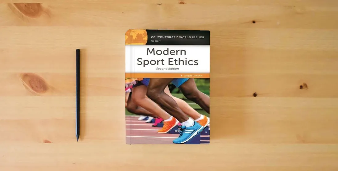 The book Modern Sport Ethics: A Reference Handbook (Contemporary World Issues)} is on the table