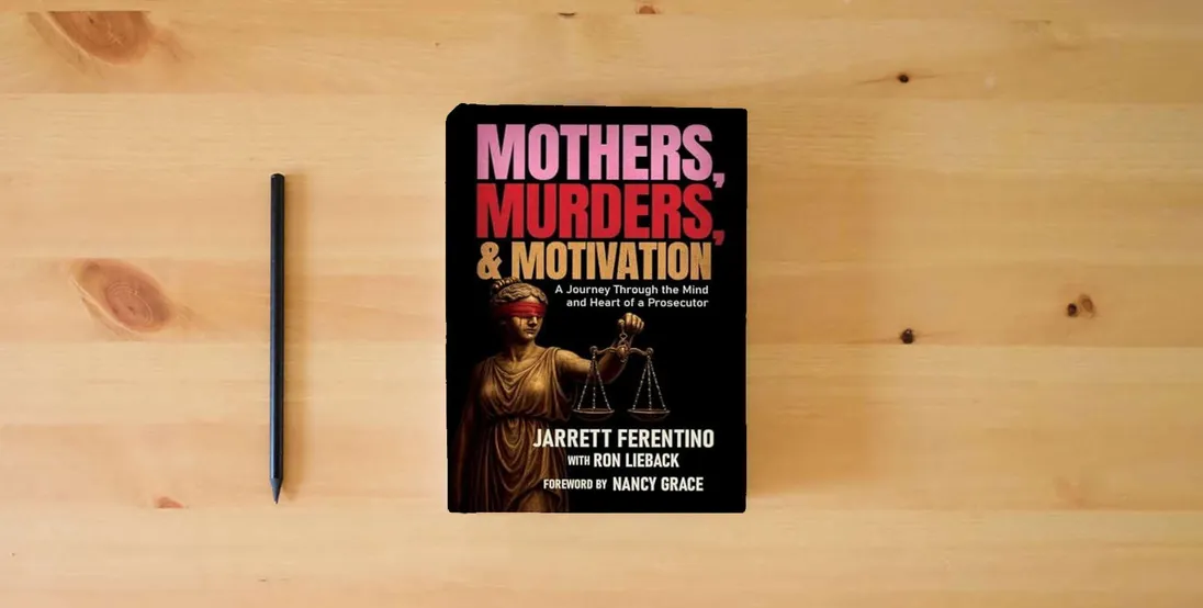 The book Mothers, Murders, and Motivation: A Journey Through the Mind and Heart of a Prosecutor} is on the table