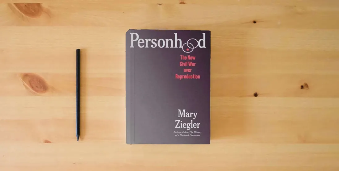 The book Personhood: The New Civil War over Reproduction} is on the table