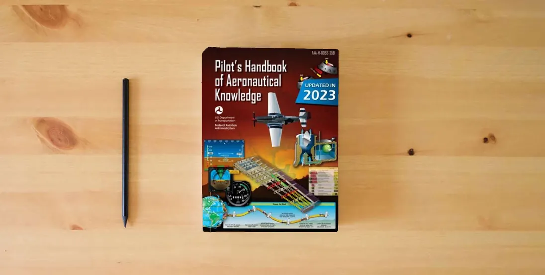 The book Pilot’s Handbook of Aeronautical Knowledge FAA-H-8083-25B (Color Print): Flight Training Study Guide} is on the table