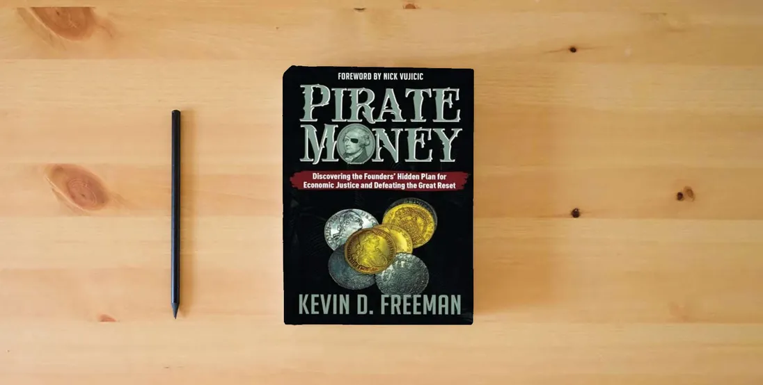 The book Pirate Money: Discovering the Founders’ Hidden Plan for Economic Justice and Defeating the Great Reset} is on the table