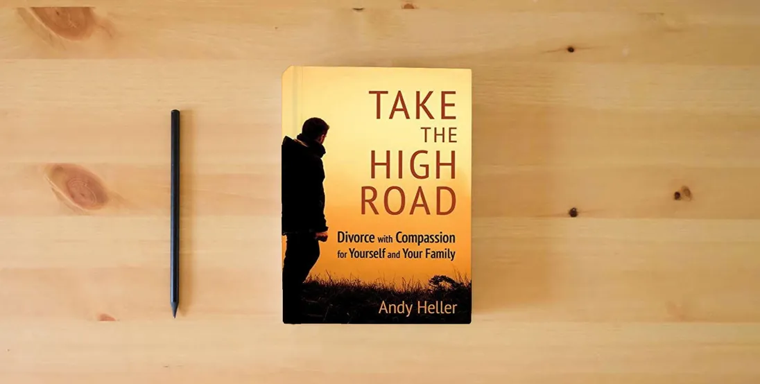The book Take the High Road: Divorce with Compassion for Yourself and Your Family} is on the table