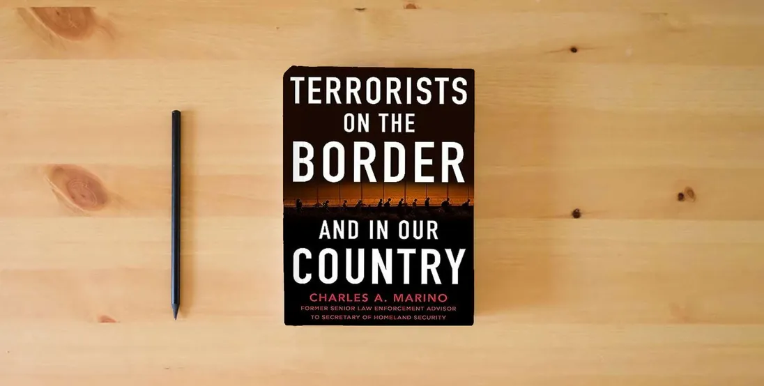 The book Terrorists on the Border and in Our Country} is on the table