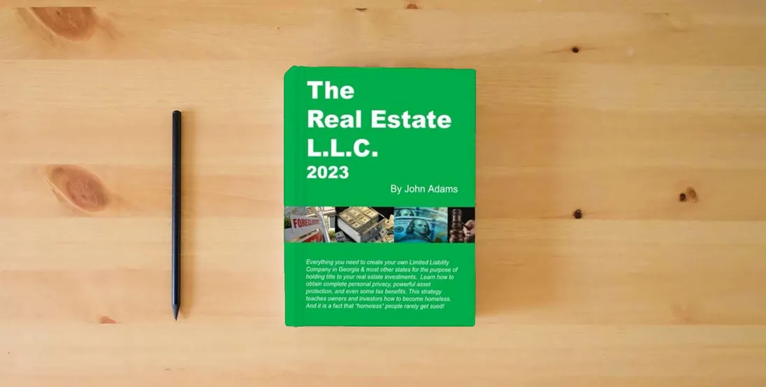 The book The 2023 Real Estate LLC: “Protect your privacy, protect your assets and protect your property”} is on the table