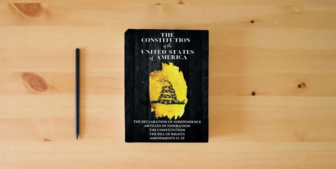 The book The Constitution of the United States: The Declaration of Independence, The Bill of Rights} is on the table