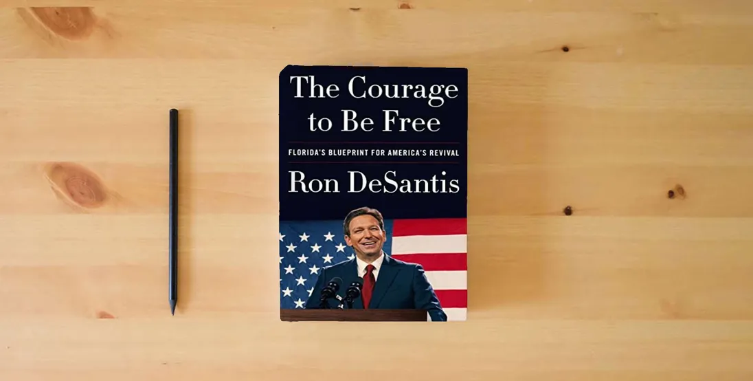 The book The Courage to Be Free: Florida's Blueprint for America's Revival} is on the table