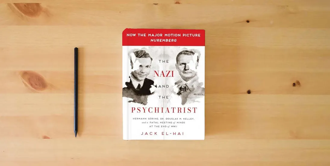 The book The Nazi and the Psychiatrist: Hermann Göring, Dr. Douglas M. Kelley, and a Fatal Meeting of Minds at the End of WWII} is on the table