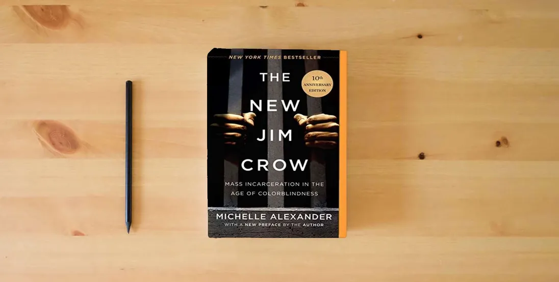 The book The New Jim Crow: Mass Incarceration in the Age of Colorblindness} is on the table