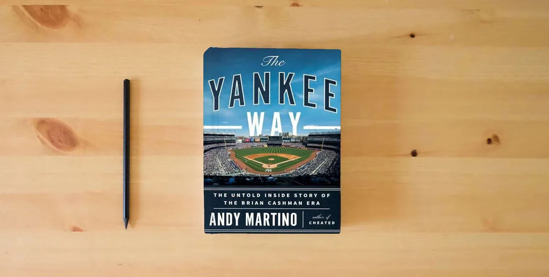 The book The Yankee Way: The Untold Inside Story of the Brian Cashman Era} is on the table