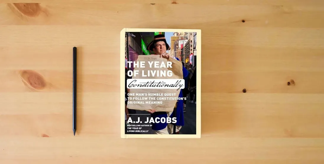 The book The Year of Living Constitutionally: One Man's Humble Quest to Follow the Constitution's Original Meaning} is on the table