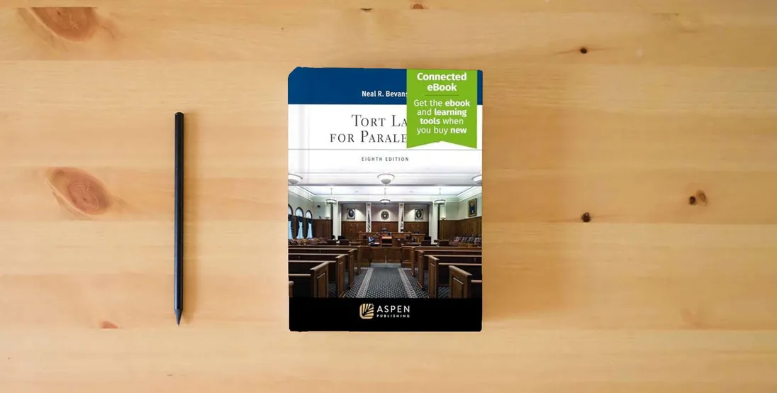 The book Tort Law for Paralegals [Connected eBook]} is on the table