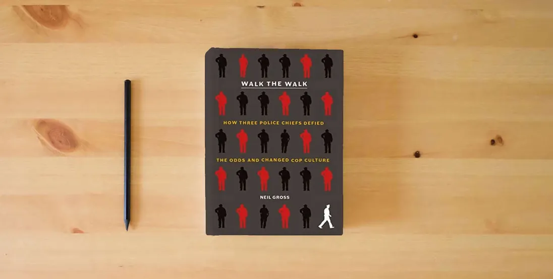 The book Walk the Walk: How Three Police Chiefs Defied the Odds and Changed Cop Culture} is on the table