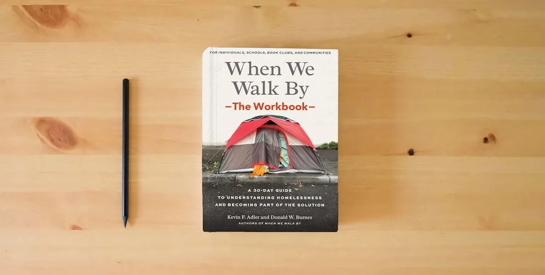 The book When We Walk By: The Workbook: A 30-Day Guide to Understanding Homelessness and Becoming Part of the Solution--For Individuals, schools, book clubs, and communities} is on the table